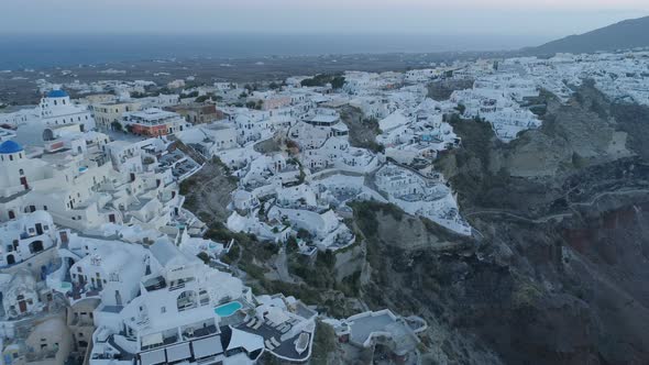 Aerial View Flying Over City of Oia on Santorini Greece alt