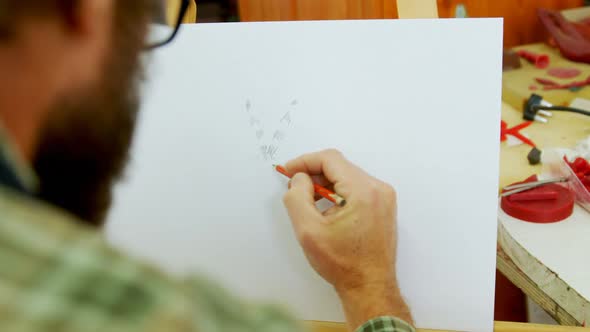 Craftsman drawing a sculpture design 4k alt