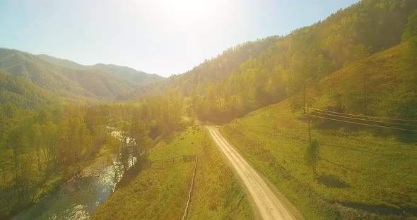 Low Altitude Flight Over Fresh Fast Mountain River with Rocks at Sunny Summer Morning alt