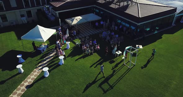 aerial shot of happy sunny Wedding day with sunbeams alt