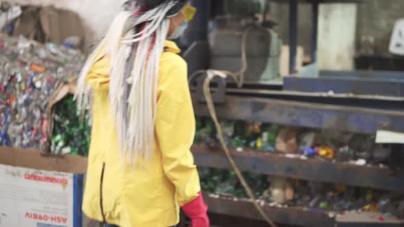 Womanworker in Yellow and Transparent Protecting Glasses Hard Hat and Mask Inspect Equipment on alt