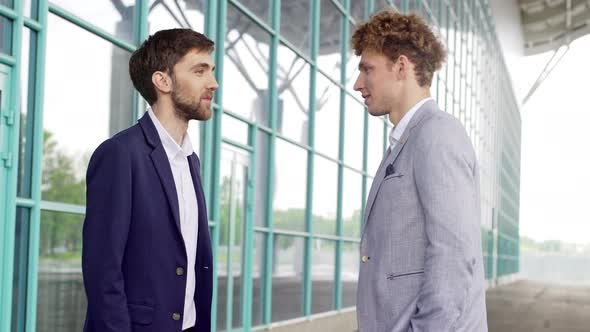 Businessman Waiting for Business Partner Coworker in Suit