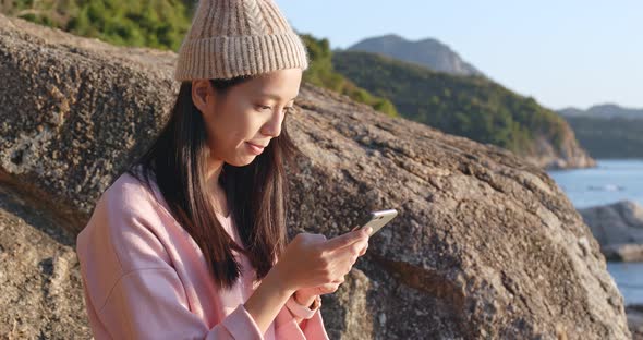 Woman Use of Mobile Phone alt
