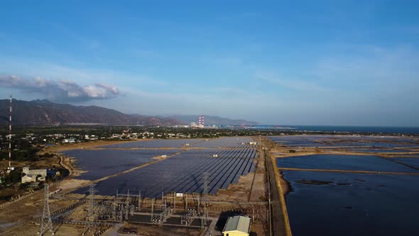 Renewable electricity power plant station with solar panels. Aerial panorama alt