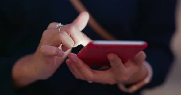 Woman use of mobile phone alt