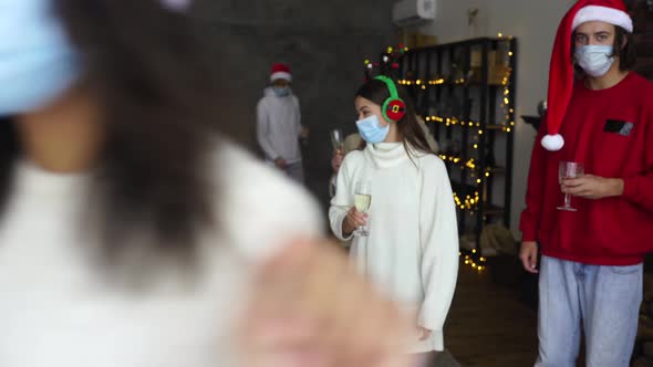 Multiethnic Young People Celebrating New Year Eve Having Fun at Party Celebration alt