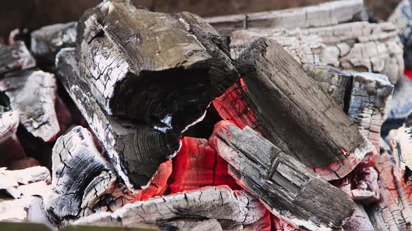 A Hot Fire Burns in a Charcoal Grill alt