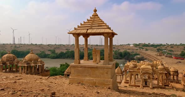 Bada Bagh Cenotaphs (Hindu Tomb Mausoleum) Made of Sandstone in Indian Thar Desert. Wind Power alt