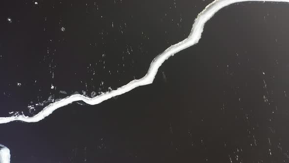 Frozen River in Aerial View alt