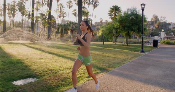 Athlete Woman Jogging In The Park alt