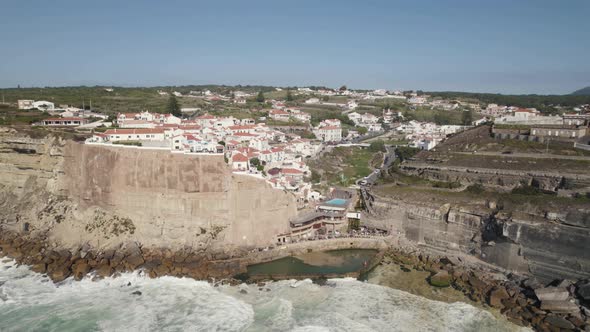 Azenhas do Mar, seaside town in the municipality of Sintra, Portugal. Ocean waves and cliffs. alt