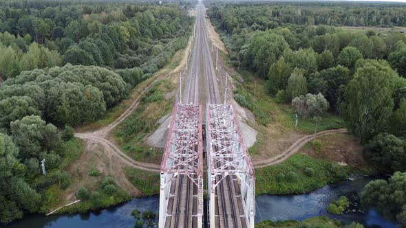 Railway Bridge Over a Small River in the Forest