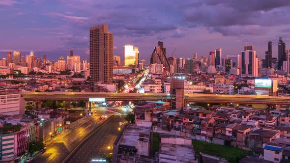 Bangkok business district city center and expressway, day to night; zoom out - Time Lapse