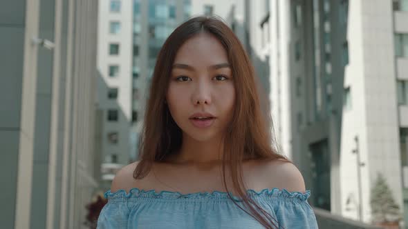 Portrait of Amazed Asian Girl Student with Bare Shoulders Female Shocked Saying WOW of the Business alt
