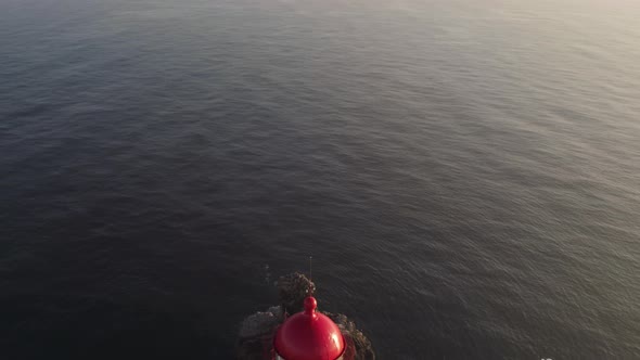 Aerial above revealing the compound of Cabo de Sao Vicente, Cape St Vincent lighthouse at Sagres. alt