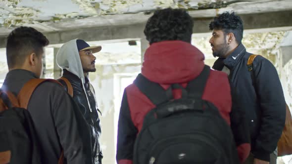 Arab Men Hanging Out in Abandoned Building alt