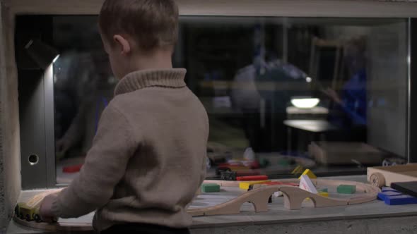 Child Playing with Toys at Home alt