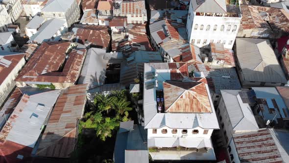Aerial View of Stone Town Zanzibar City Slum Roofs and Poor Streets Africa alt