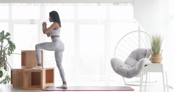 Black woman in sportswear doing workout burning fat calories.