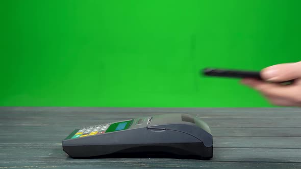 Man Pays Coffee with Nfc System and a Smartphone Device Wirelessly alt