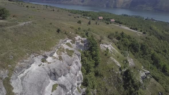 Scenic View Rock Monastery Bakota on Dniester River, Ukraine