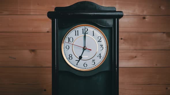 Timelapse of Vintage Clock with Full Turn of Time Hands at 7 AM or PM alt