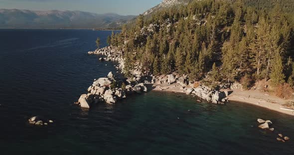 Drone zoom out over chimney beach at Lake Tahoe 