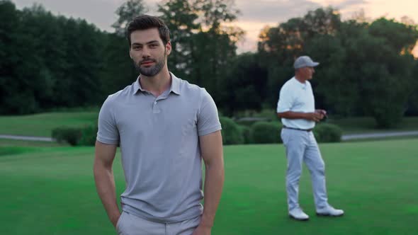 Smiling Golfer Enjoy Play on Activity Course alt