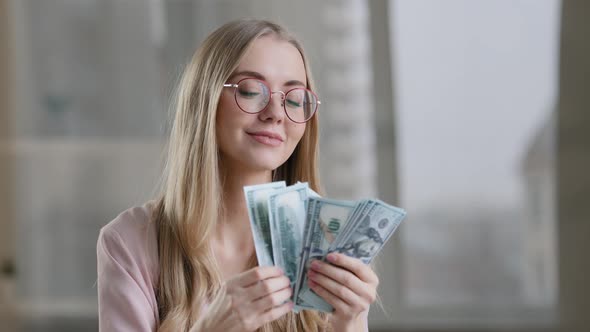 Joyful Rich Girl Counting Cash in Office Successful Caucasian Lady Businesswoman Getting Bundle of alt