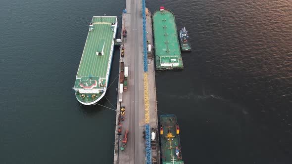 Aerial view of Yacht and boats docking at the marina in the evening. alt