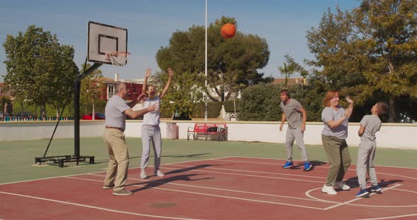 Family Basketball Players Practice on Playground. Attack Opponent, Owns Ball, Change of Leadership alt