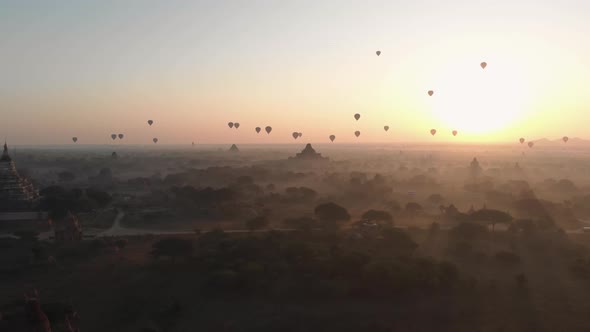 Aerial view of hot balloons in the Old Bagan temple site. alt