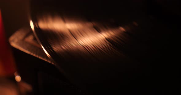 Vinyl Record Playing At Candle Light