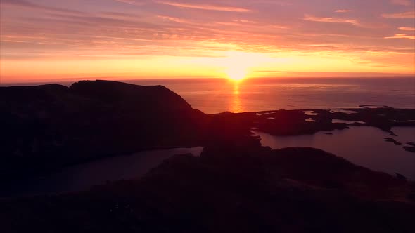 Midnight sun on Vesteralen islands, aerial view alt