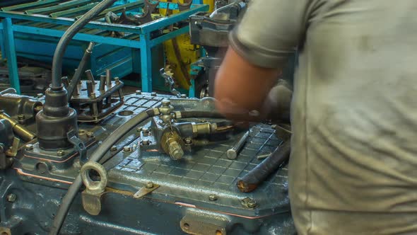 Tractor Engine Assembled on the Factory Production Line on Tractor Factory Timelapse alt