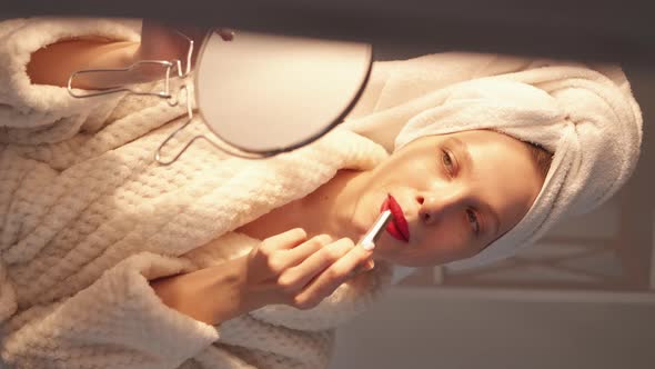 Vertical Video Morning Makeup Woman Red Lipstick alt