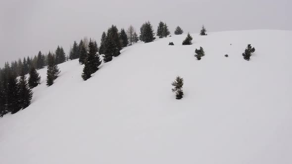 Beautiful View On Snowfall Over Skiing Tracks In Mountains