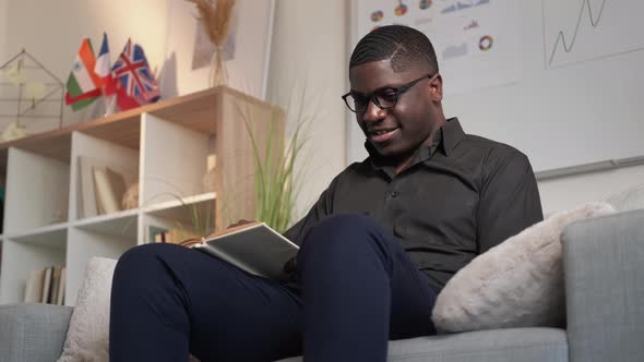 Book Inspiration Professional Development Man Sofa alt