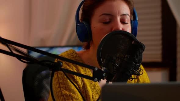 Close Up of Professional Influencer Making Podcast From Home Studio alt