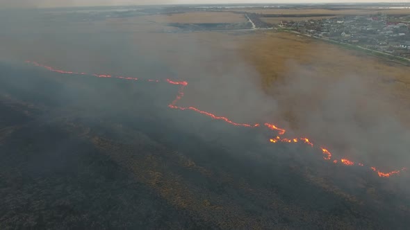 Aerial Shot of Flaming Cane and Sedge Wetland in the Dnipro Basin in Spring 