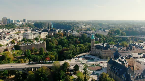Establishing Aerial Shot of Luxembourg Cityscape with Landmark Adolphe Bridge