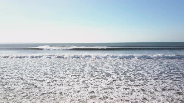 Calm And Relaxing View Of The Waves Crashing Unto The Beach At Saunton Sands England - wide shot alt