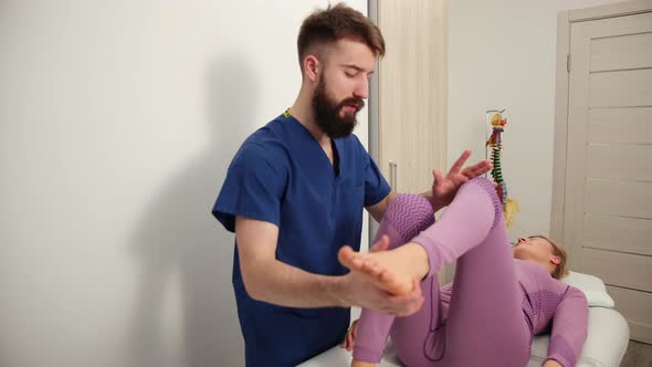 Doctor Osteopath Have Manual Therapy for Woman s Leg alt