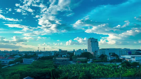Bangkok. Blue cloudy sky at summer day with Urban forest and Cityscape