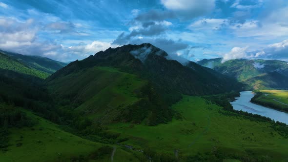 Landscape of mountains in summer. Fog. Aerial view alt