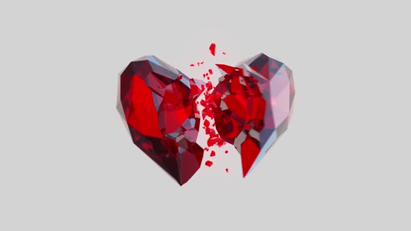 Breaking Ruby Crystal Heart on Light Grey Background alt