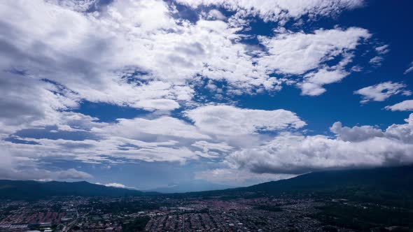 180 Hyperlapse City Landscape Blue Skies and Volcano