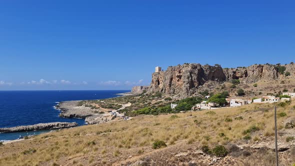 Bautiful Baia Santa Margherita and torre Isulidda medieval watchtower in Sicily. Italy alt