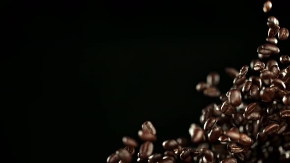 Super Slow Motion Shot of Exploding Premium Coffee Beans at 1000Fps alt
