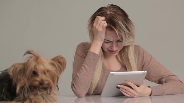 Young Woman with dog suffering from stress